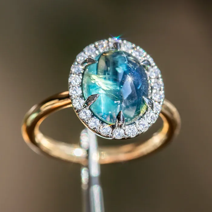 448ct Oval Cabochon Parti Sapphire and Antiqued Diamond Halo ring in 18k Yellow Gold Anueva Jewelry Rings