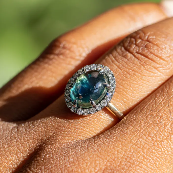 448ct Oval Cabochon Parti Sapphire and Antiqued Diamond Halo ring in 18k Yellow Gold Anueva Jewelry Rings