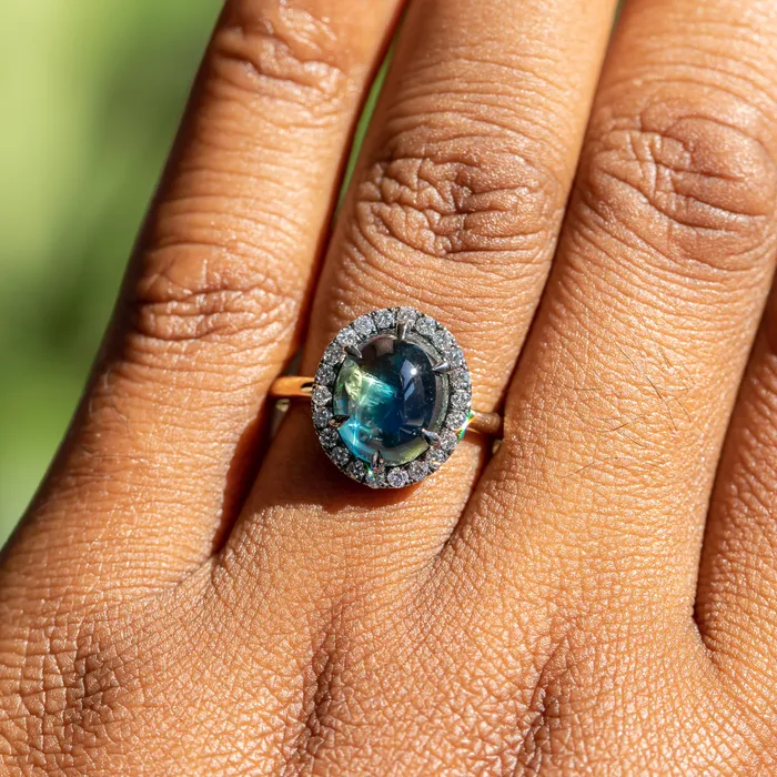 448ct Oval Cabochon Parti Sapphire and Antiqued Diamond Halo ring in 18k Yellow Gold Anueva Jewelry Rings