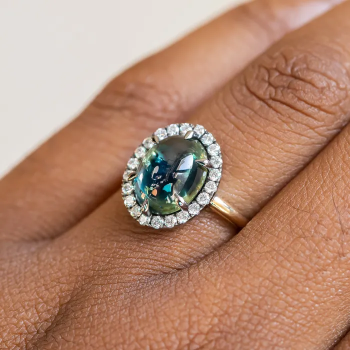 448ct Oval Cabochon Parti Sapphire and Antiqued Diamond Halo ring in 18k Yellow Gold Anueva Jewelry Rings