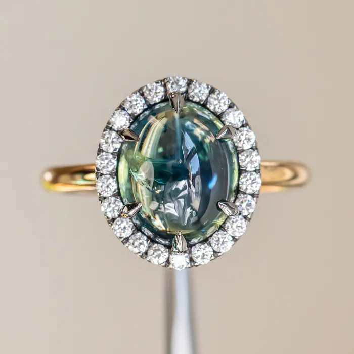 448ct Oval Cabochon Parti Sapphire and Antiqued Diamond Halo ring in 18k Yellow Gold Anueva Jewelry Rings
