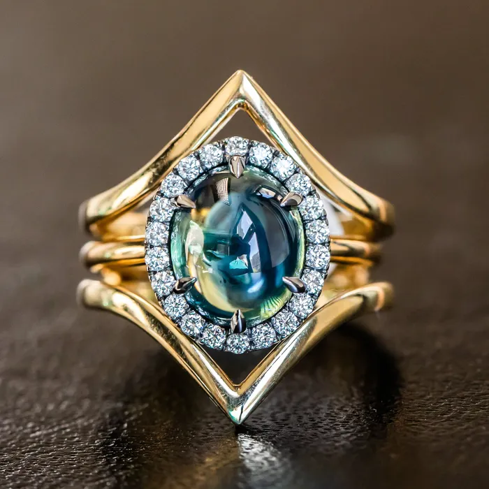 448ct Oval Cabochon Parti Sapphire and Antiqued Diamond Halo ring in 18k Yellow Gold Anueva Jewelry Rings