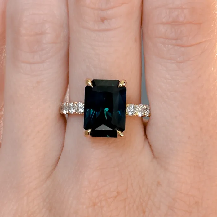 Rings 612ct Deep Teal Blue Madagascar Radiant Cut Sapphire Solitaire Ring with French Set Diamonds in 18k Yellow Gold Anueva Jewelry