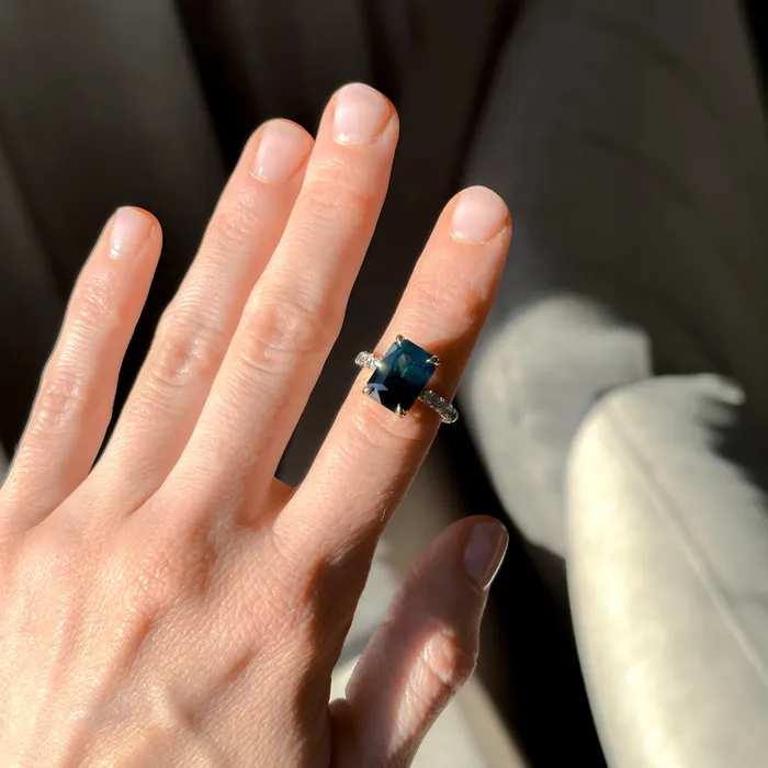Rings 612ct Deep Teal Blue Madagascar Radiant Cut Sapphire Solitaire Ring with French Set Diamonds in 18k Yellow Gold Anueva Jewelry