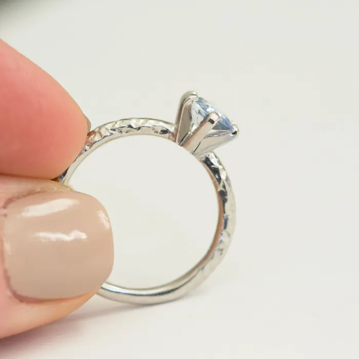 Rings Anueva Jewelry Light Periwinkle Blue Oval Sapphire Ring in Hand Carved Recycled Platinum Earthy Setting Sixprong Sapphire Engagement Ring by Anueva Jewelry Rings Anueva Jewelry Light Periwinkle Blue Oval Sapphire Ring in Hand Carved Recycled Platinum Earthy Setting Sixprong Sapphire Engagement Ring by Anueva Jewelry