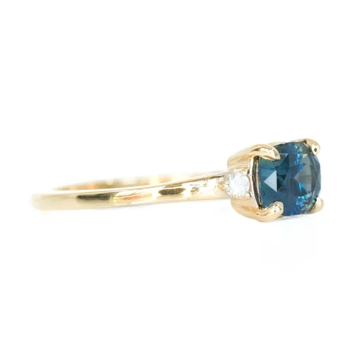 Rings Anueva Jewelry Teal Blue Three Stone Ring featuring 115ct cushion sapphire and diamonds in EastWest setting