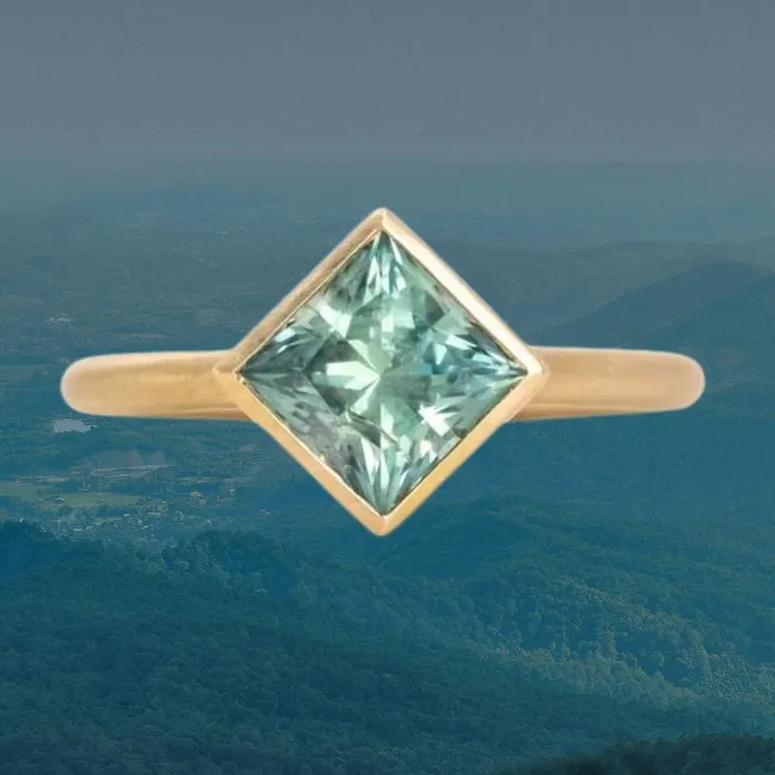 Rings Obsessed Over Gems 217ct Princess Cut Teal Montana Sapphire Contemporary Bezel Set Ring in 18k Yellow Gold Rings Obsessed Over Gems 217ct Princess Cut Teal Montana Sapphire Contemporary Bezel Set Ring in 18k Yellow Gold